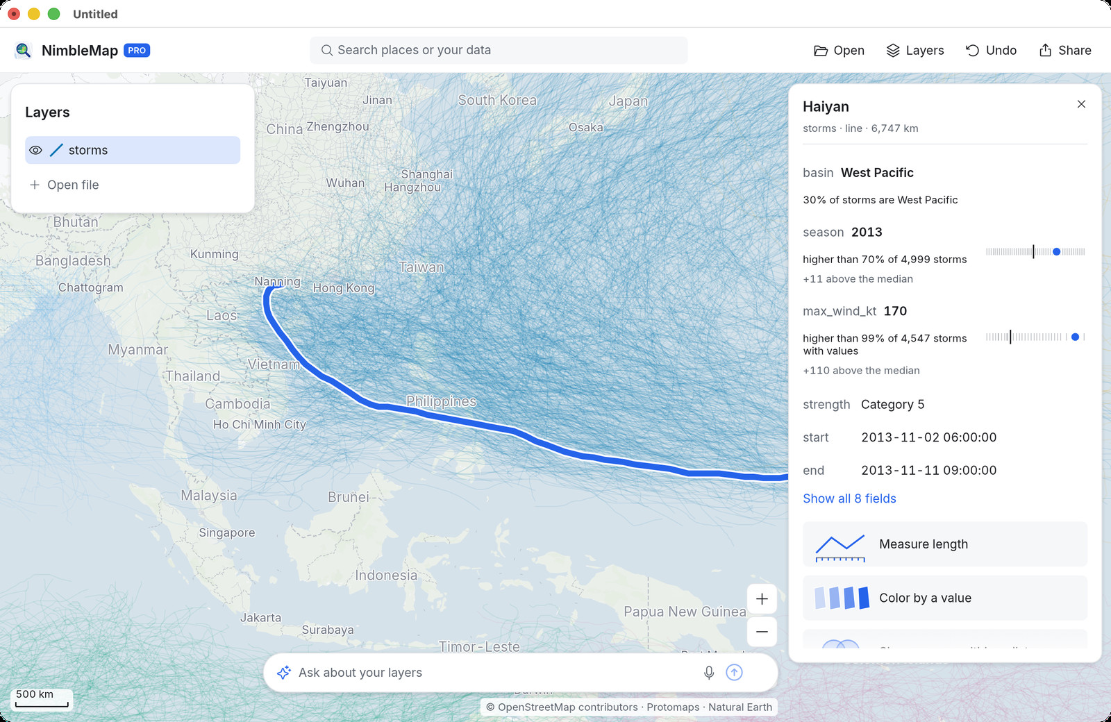 The same Haiyan card in NimbleMap Pro, with Measure length and Show an area within a distance buttons, and the Ask about your layers box at the bottom of the map.